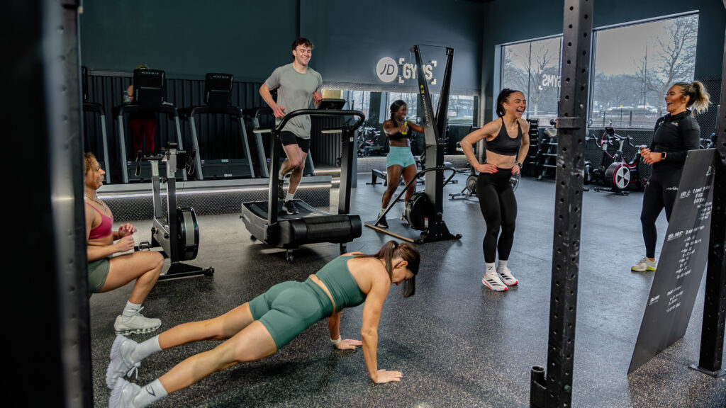 Image shows a group of young people attending a fitness class, showcasing the premise of being Stronger than Yesterday.